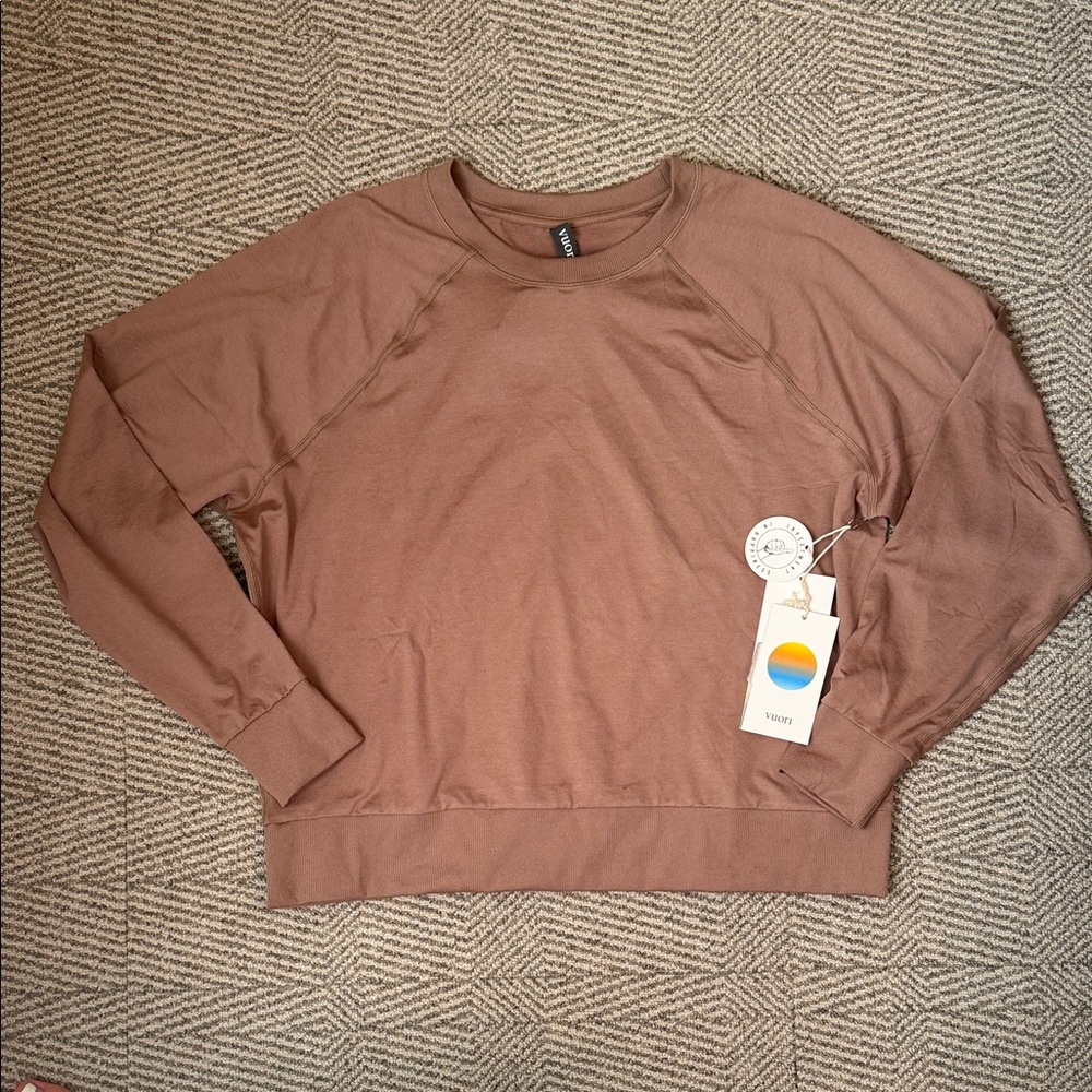 Vuori woman’s Tan Crewneck size xs new with tags